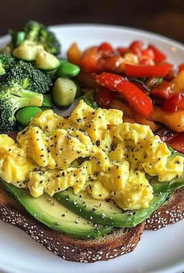 Avocado Toast with Scrambled Eggs & Sauted Veggies