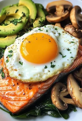 Pan-Seared Salmon with Sunny Egg, Sautéed Spinach, Mushrooms & Avocado
