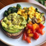 Rainbow Avocado Toast with Scrambled Eggs & Veggie Medley
