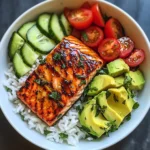 Honey-Glazed Salmon Bowl with Rice, Avocado, Cucumber & Tomato Herb Salad