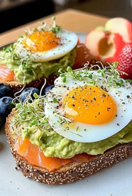 Smoked Salmon & Egg Avocado Toast Plate with Fresh Fruit & Tea