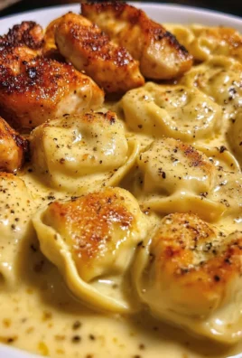 Velvety Cajun Chicken Tortellini with Three-Cheese Sauce